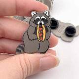 Hot Dog Loving Raccoon Enamel Pin